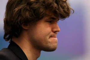 Chess Sensation: 9-Year-Old Indian Player Draws with Magnus Carlsen in Online Tournament
OR
Magnus Carlsen Held to Draw by 9-Year-Old Indian Chess Prodigy in Online Clash
OR
Indian Chess Prodigy, 9, Secures Draw Against World Champion Magnus Carlsen